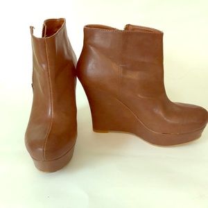 Brown wedge booties
